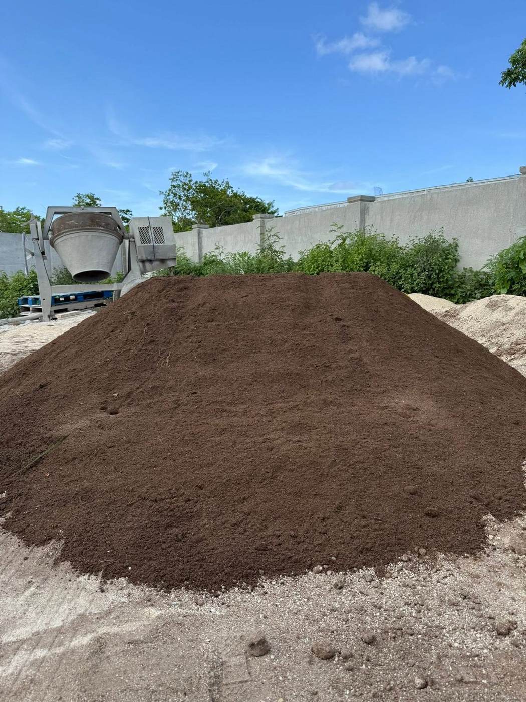 Fresh topsoil pile delivered on a Grand Cayman jobsite